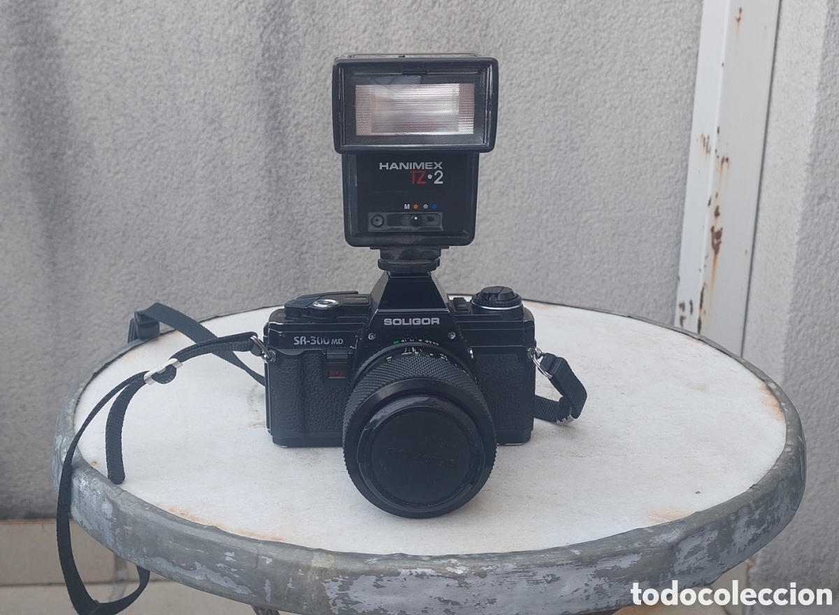 Fotokamera: C&aacute;mara fotogr&aacute;fica Soligor SR-300 MD y flash Hanimex TZ 2