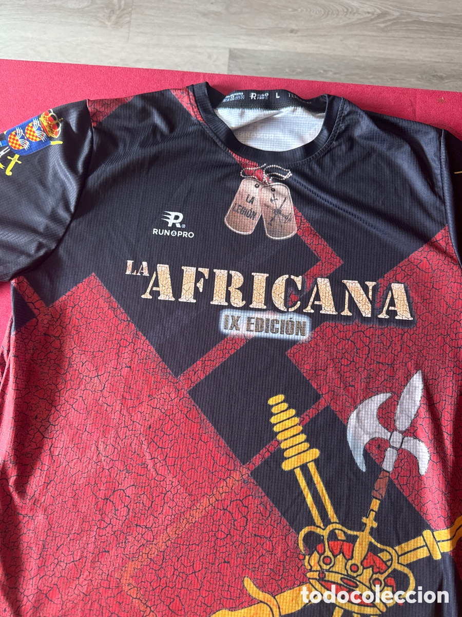 Coleccionismo deportivo: Camiseta de la IX edici&oacute;n de la Carrera Aficana