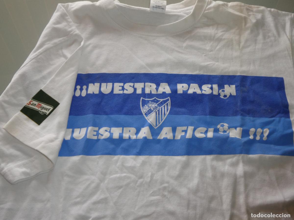Coleccionismo deportivo: CAMISETA M&Aacute;LAGA CLUB DE F&Uacute;TBOL. PATROCINADOR CERVEZA SAN MIGUEL. NUESTRA PASI&Oacute;N AFICI&Oacute;N. L. 150GR