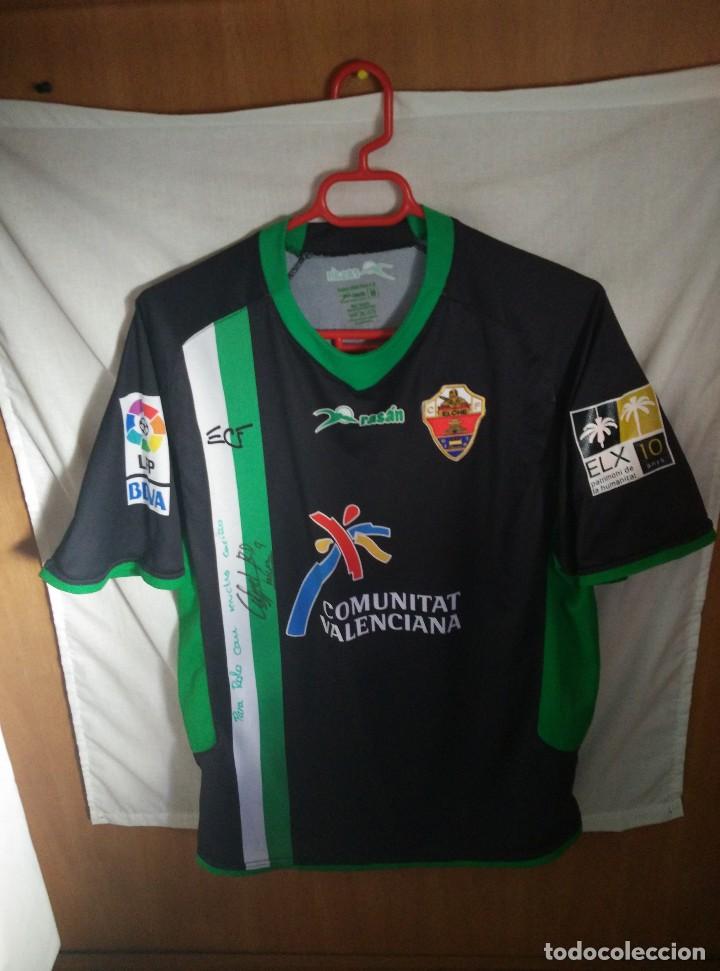 Sports collectibles: Original | Futbol | Talla M | Camiseta del Elche #9 ANGEL - MATCH WORN Y DEDICADA