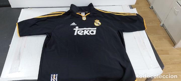 Colecionismo desportivo: ANTIGUA CAMISETA DEL REAL MADRID TEKA NEGRA