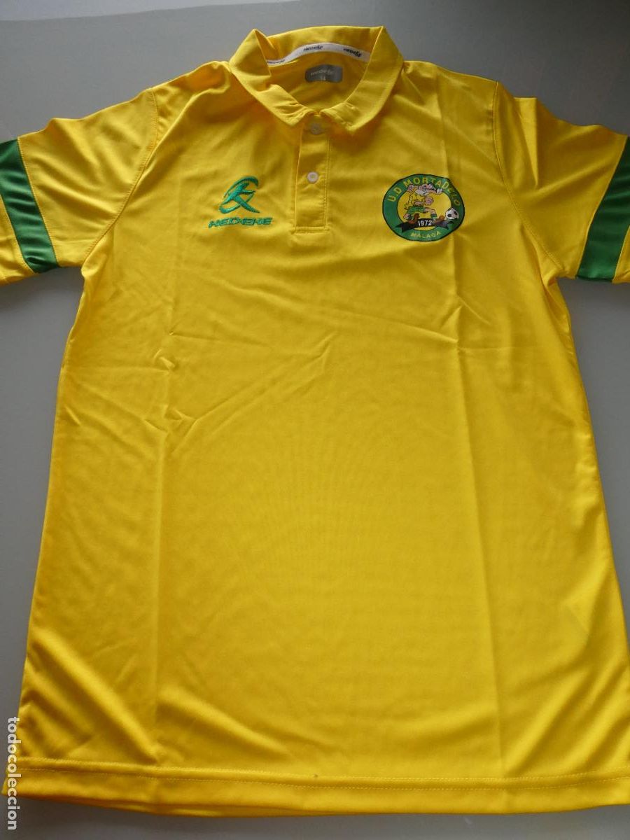 Coleccionismo deportivo: CAMISETA DE F&Uacute;TBOL MODESTO MALAGUE&Ntilde;O. UD MORTADELO M&Aacute;LAGA POLO. 140GR