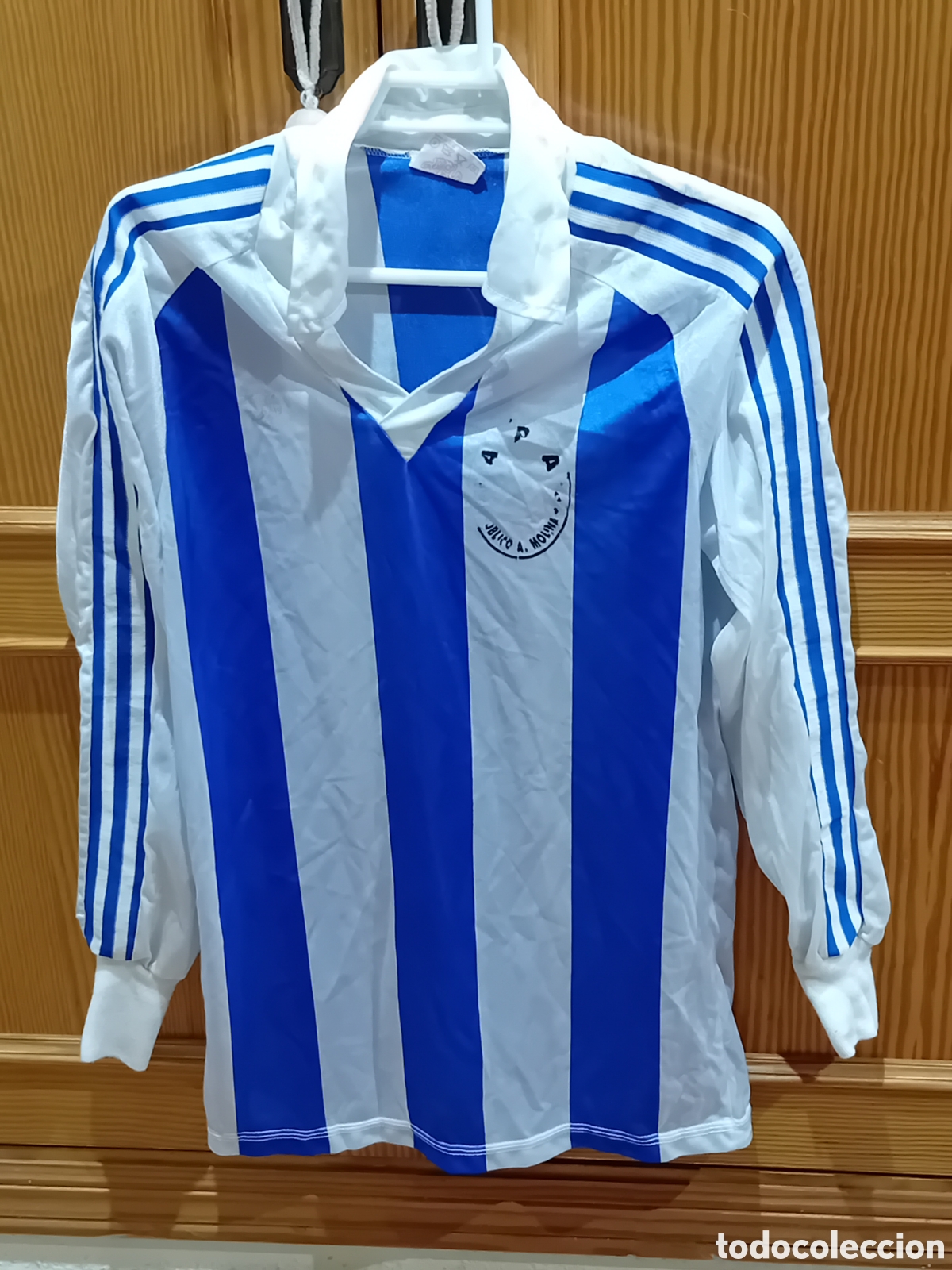 Coleccionismo deportivo: CAMISETA VINTAGE FUTBOL JUAN CASABELLA BLANQUIAZUL REAL SOCIEDAD MIDE 69 CM