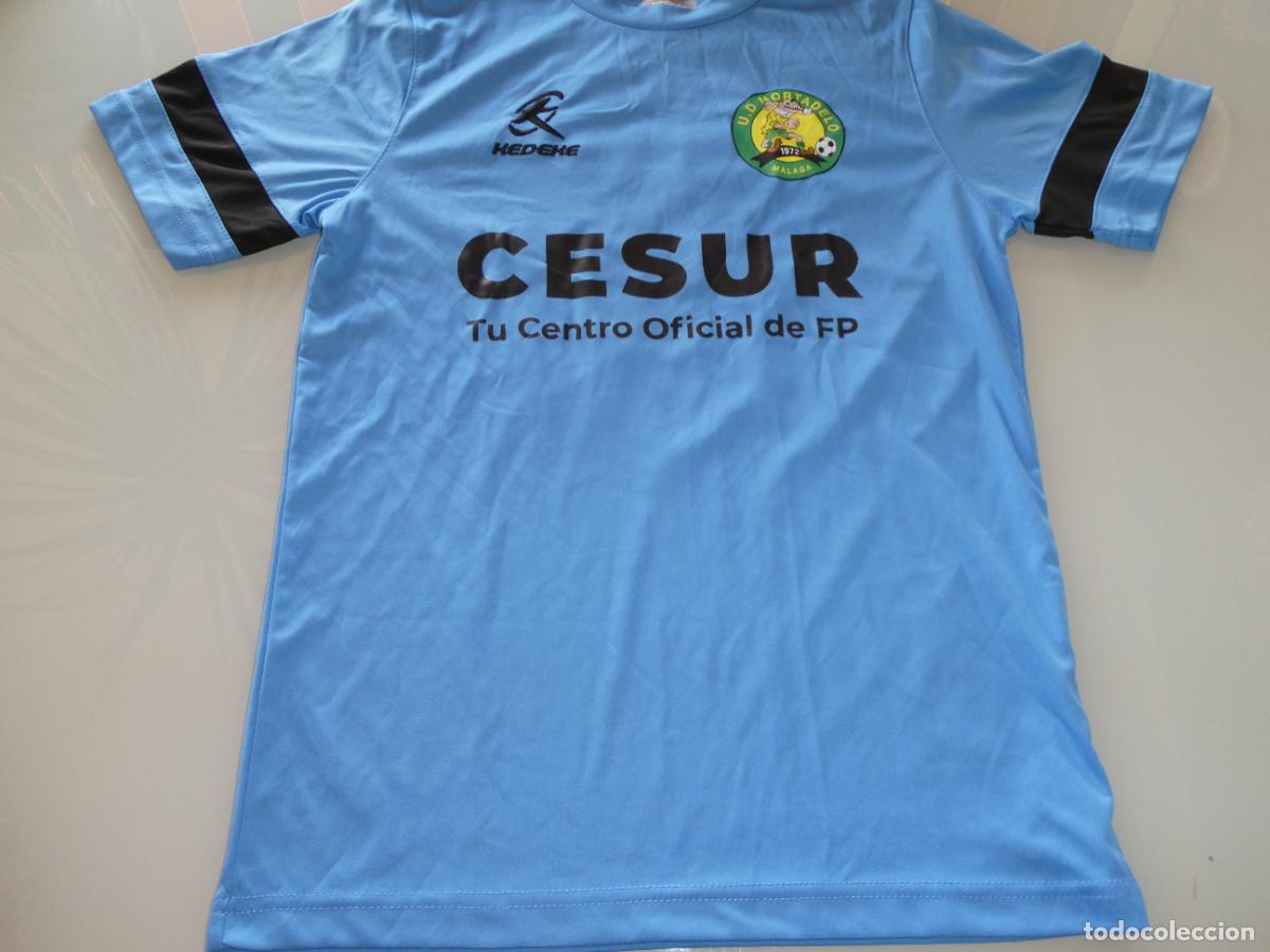 Coleccionismo deportivo: CAMISETA DE F&Uacute;TBOL MODESTO MALAGUE&Ntilde;O. U.D. MORTADELO M&Aacute;LAGA. 120GR