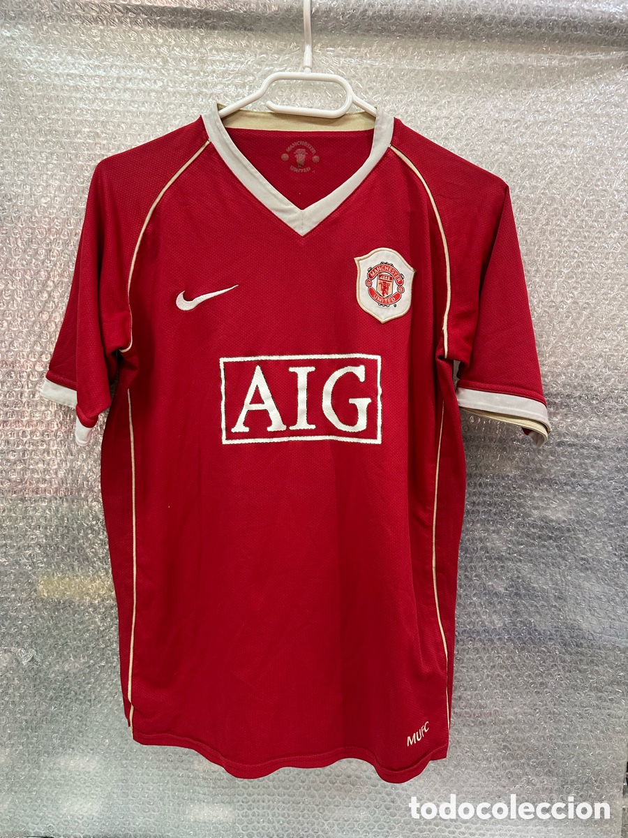 Sports collectibles: Antigua Camiseta deportiva de F&uacute;tbol M&Aacute;NCHESTER UNITED TALLA -S- AIG