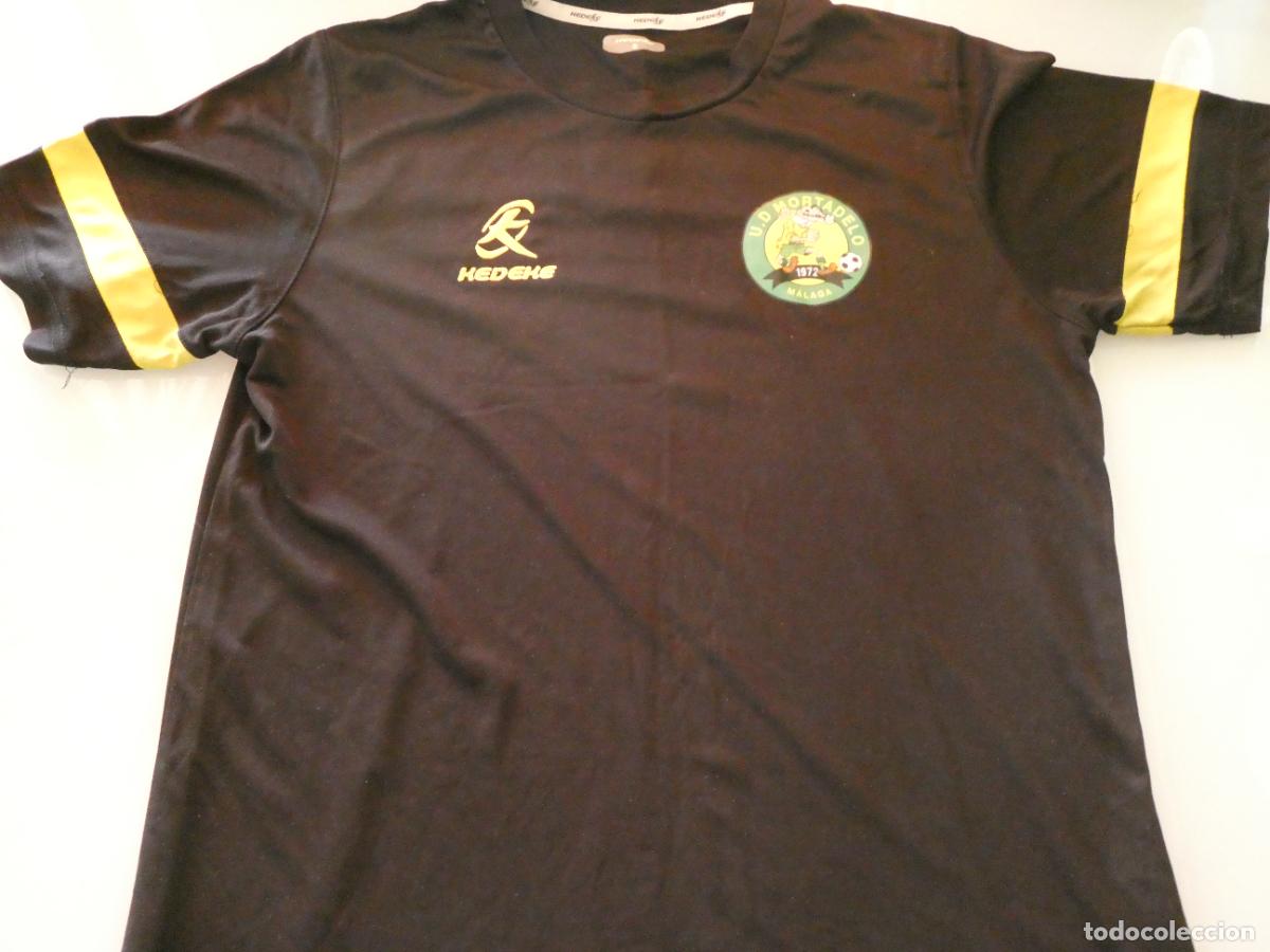 Coleccionismo deportivo: CAMISETA DE F&Uacute;TBOL MODESTO MALAGUE&Ntilde;O. UD MORTADELO M&Aacute;LAGA. TALLA S. 120GR