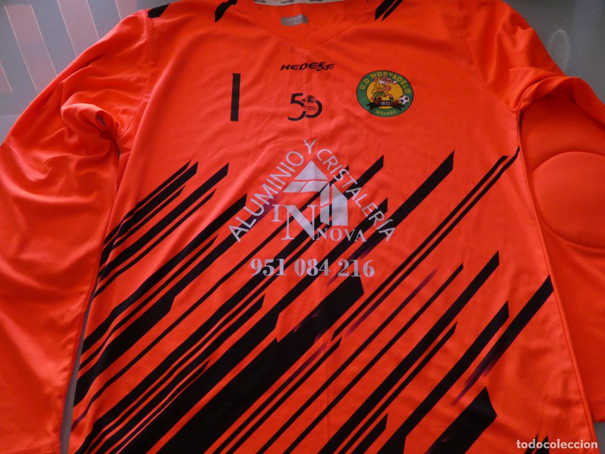 Coleccionismo deportivo: CAMISETA DE F&Uacute;TBOL MODESTO MALAGUE&Ntilde;O. PORTERO UD MORTADELO M&Aacute;LAGA. TALLA S. 220GR