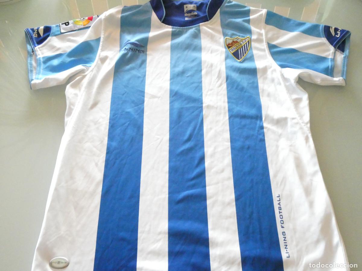Coleccionismo deportivo: CAMISETA DE F&Uacute;TBOL, M&Aacute;LAGA CLUB DE F&Uacute;TBOL. A&Ntilde;O 2010 2011. TALLA M. 170GR
