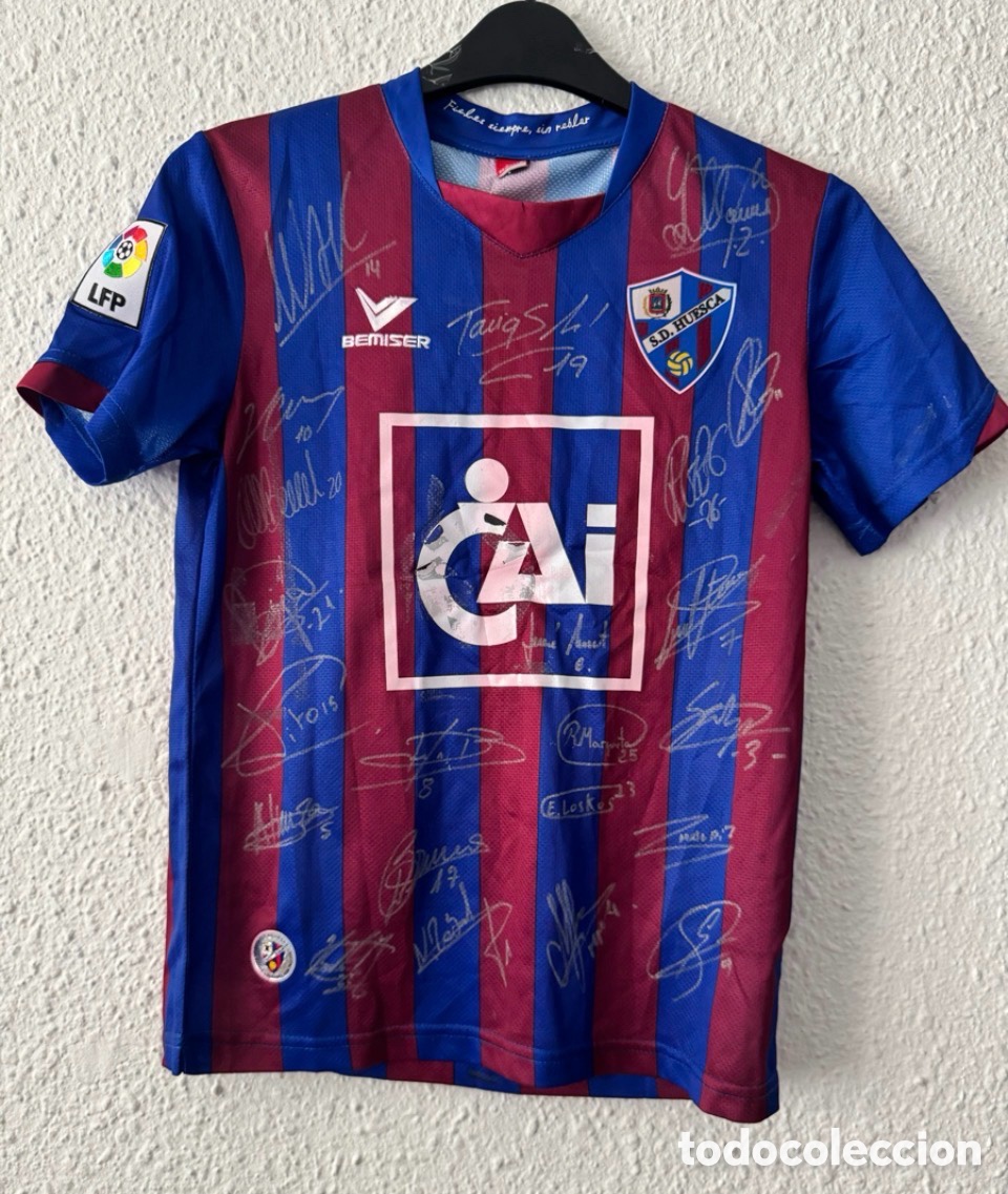 Coleccionismo deportivo: Antigua Camiseta deportiva firmada de la SD Huesca TALLA -14- Bemiser