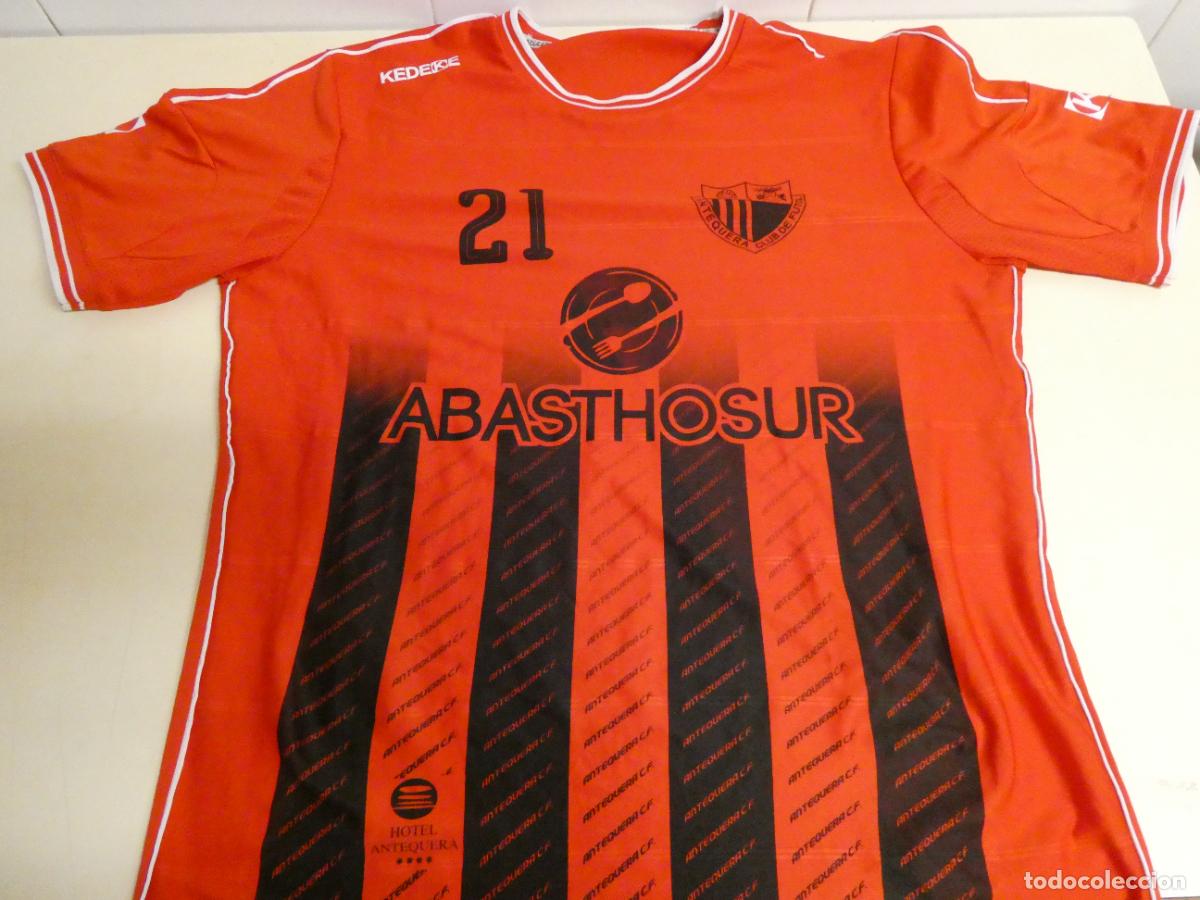 Coleccionismo deportivo: CAMISETA DE F&Uacute;TBOL. ANTEQUERA CF M&Aacute;LAGA. 170GR