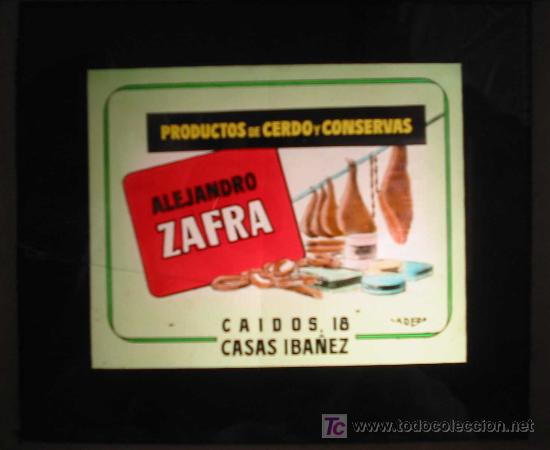 Posters: Antigua PUBLICIDAD EN CRISTAL PARA CINES : Productos del Cerdo y Conservas Alejandro Zafra.