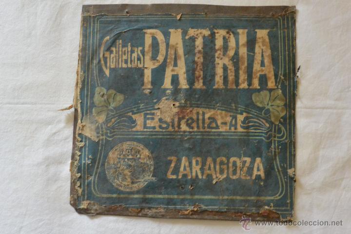 Plakate: CHAPA LATA CON PUBLICIDAD GALLETAS PATRIA