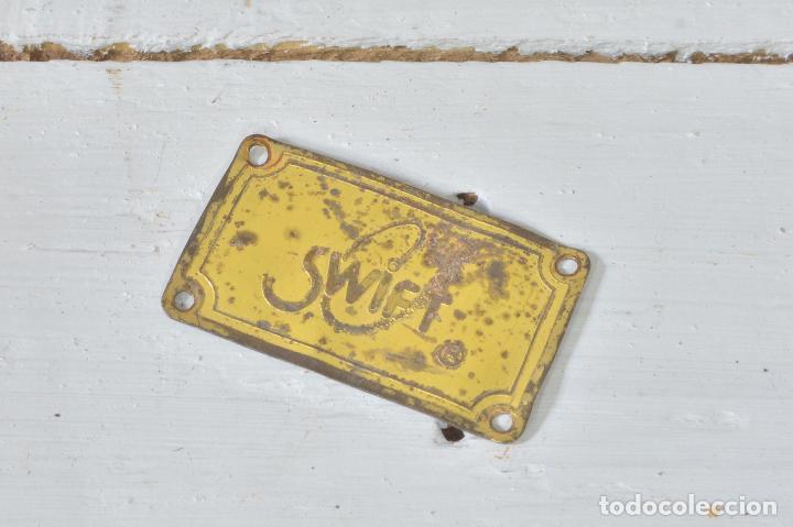 Plakate: CHAPA ANTIGUA DECORATIVA SWIFT LOGO EMBLEMA DE METAL PLACA