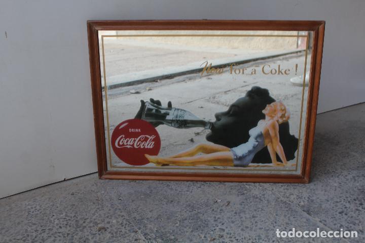 Affiches: espejo publicidad cocacola