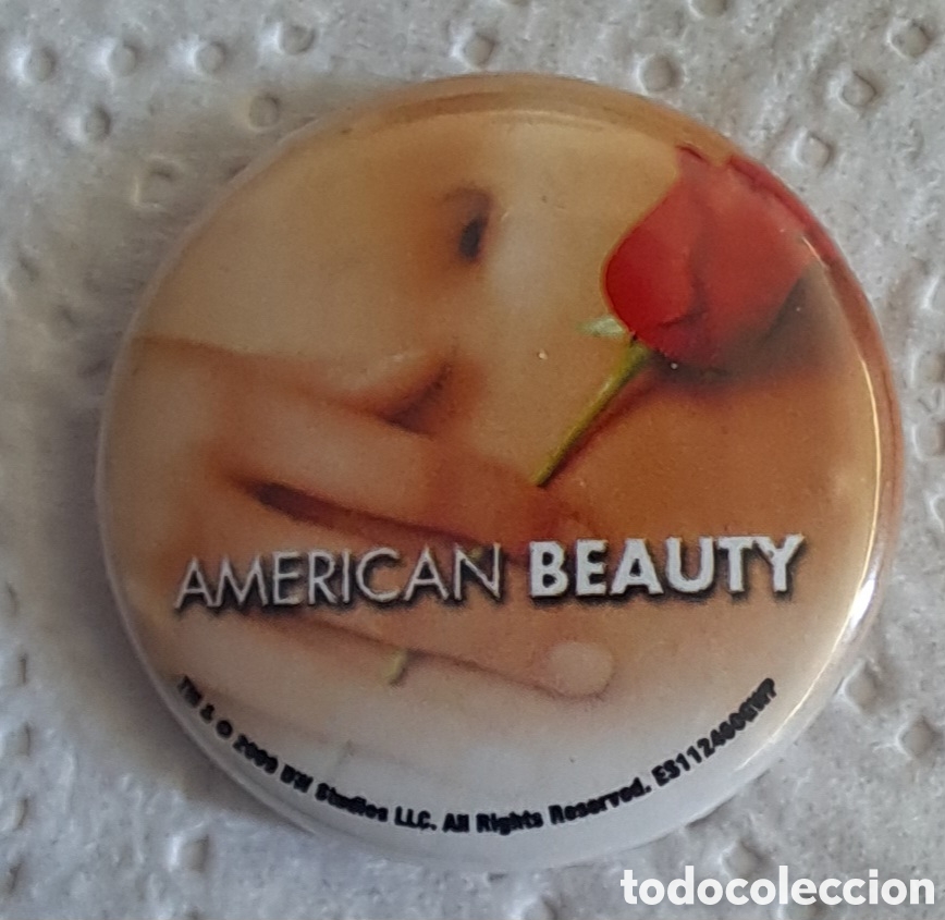 Carteles: CHAPA IMPERDIBLE PUBLICIDAD PEL&Iacute;CULA AMERICAN BEAUTY