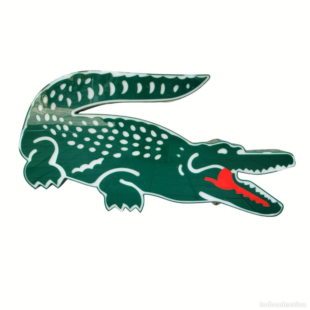 Carteles: Letrero luminoso publicitario del cocodrilo, logotipo de Lacoste, d&eacute;cada de 1980