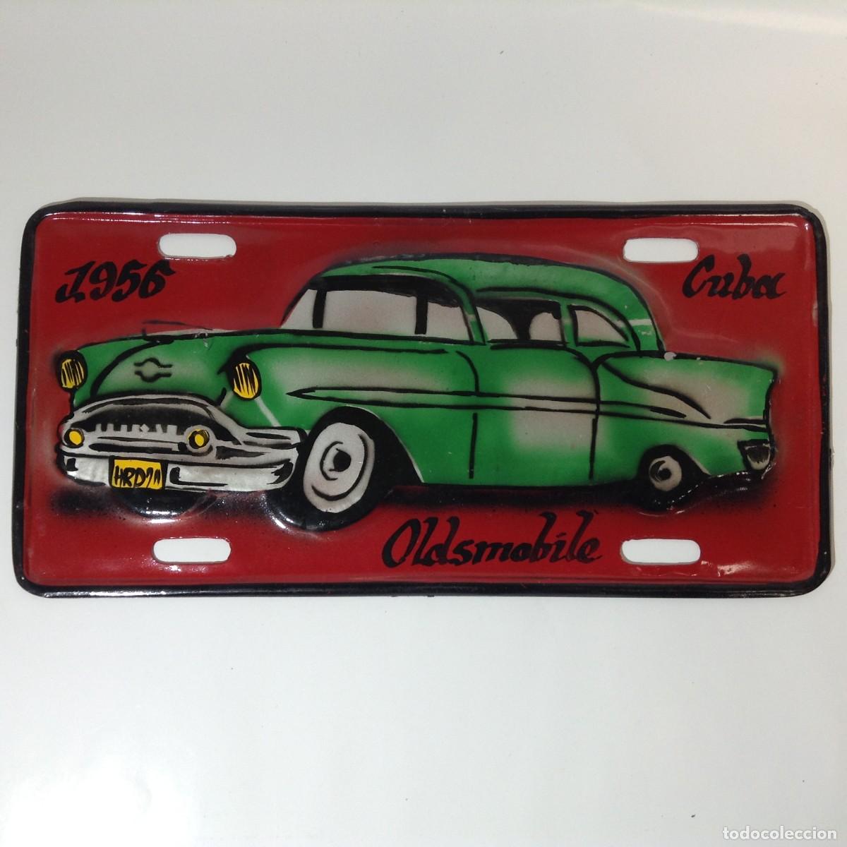 Carteles: PLACA CONMEMORATIVA DE METAL - OLDSMOBILE - CUBA 1956