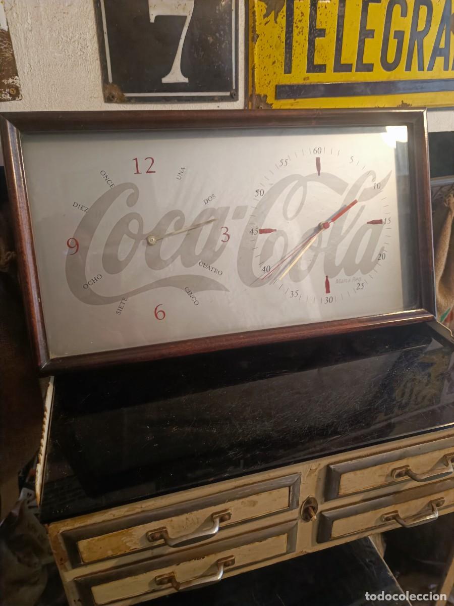 Carteles: Reloj de coca cola funcionando