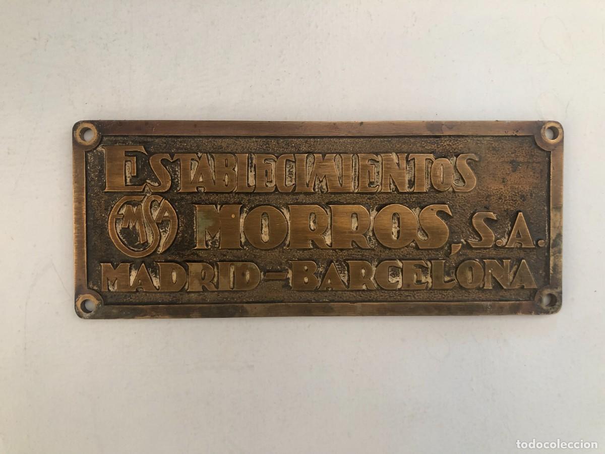 Carteles: PLACA DE METAL (24,5 X 9,5 APROX.) DE ESTABLECIMIENTOS MORROS S.A.