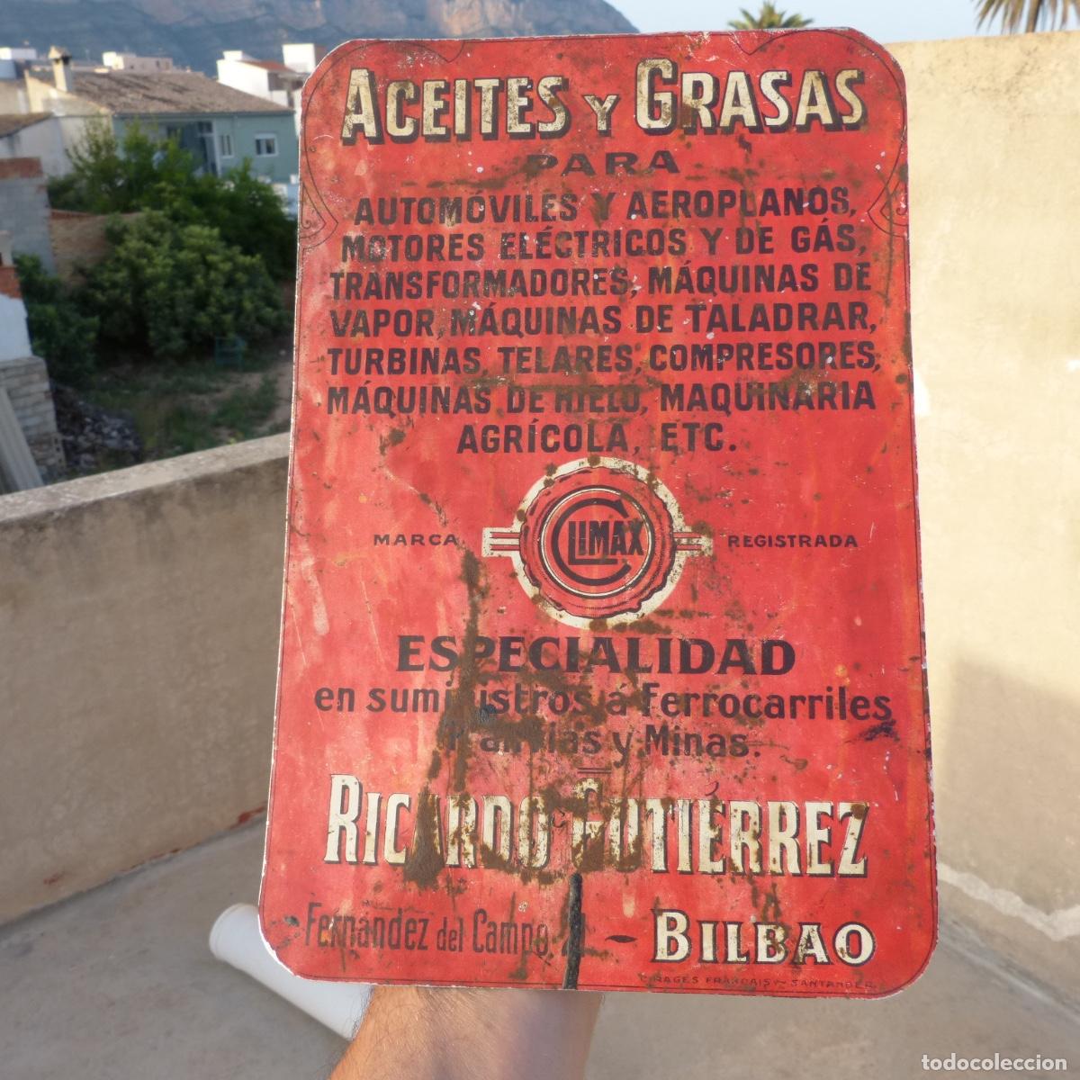Carteles: chapa de hojalata realizada a partir de una lata de grasa o aceite, climax, ricardo gutierrez.