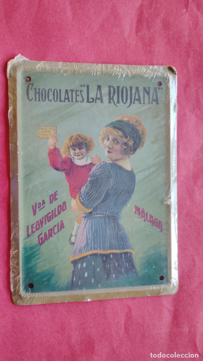Carteles: VIUDA DE LEOVIGILDO GARCIA.-CHOCOLATES LA RIOJANA.-CHAPA METALICA.-MALAGA.