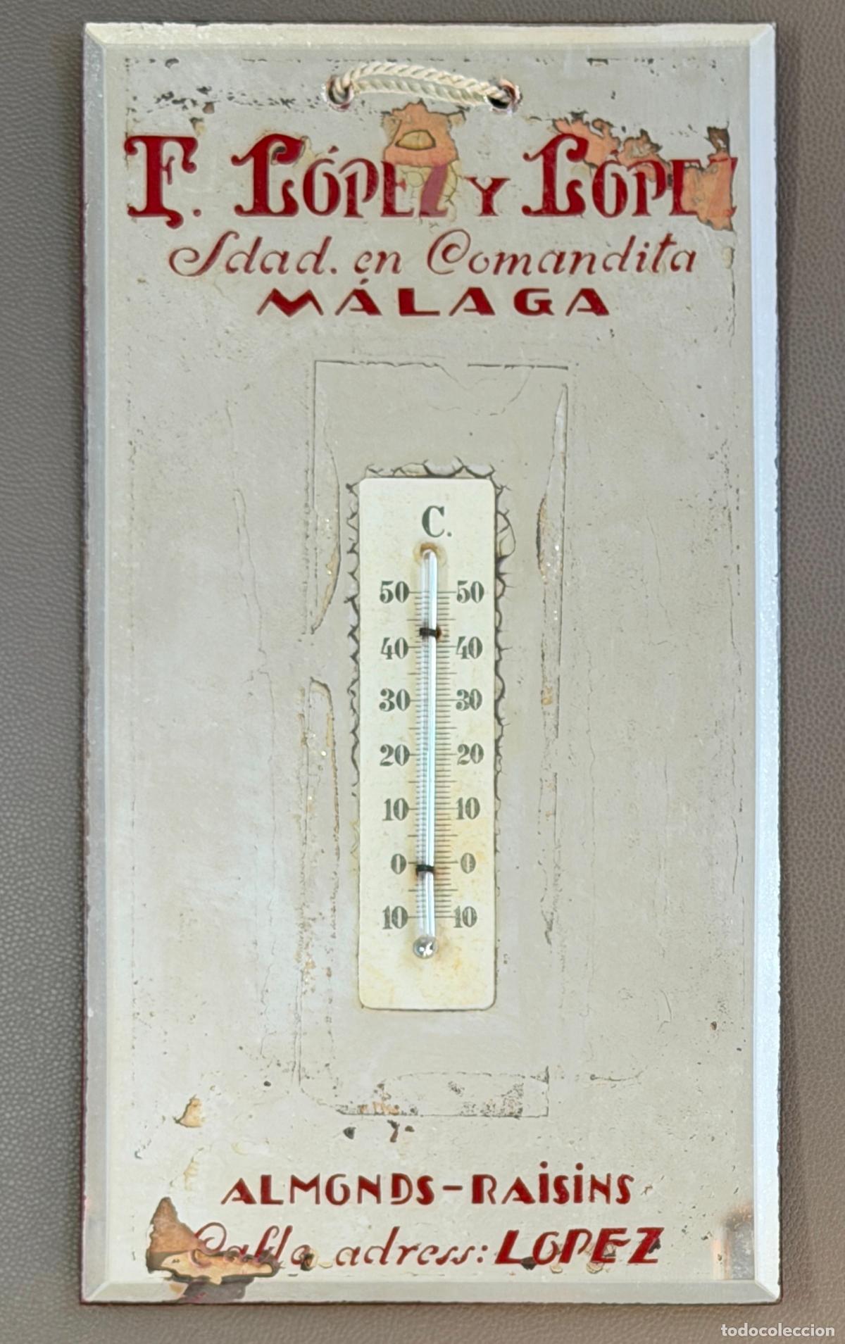 Carteles: Antiguo espejo term&oacute;metro con publicidad de M&aacute;laga , bodegas , pasas y almendras , a&ntilde;o 1933
