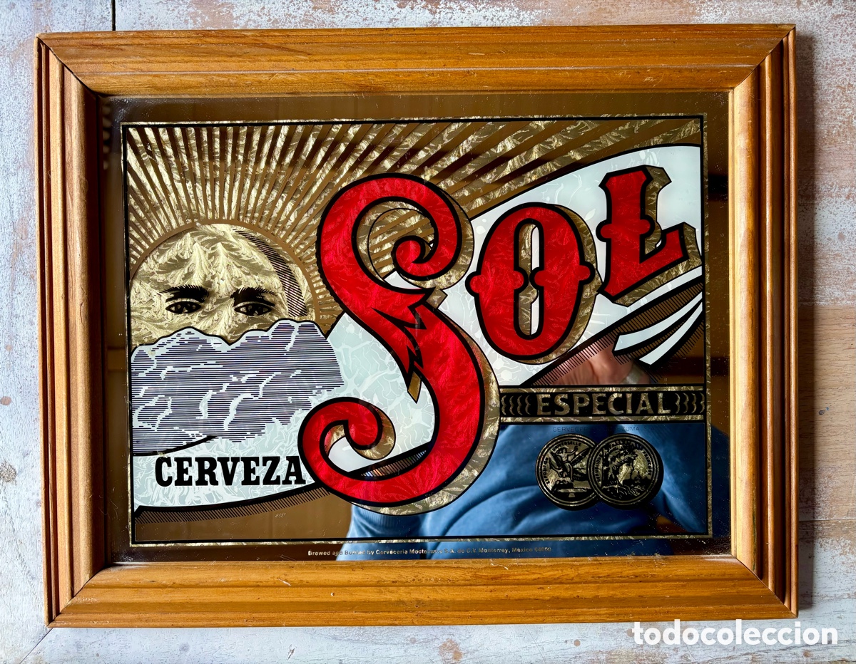 Carteles: El espejo publicitario de Cerveza Sol Especial. Vintage de la d&eacute;cada de 1970.