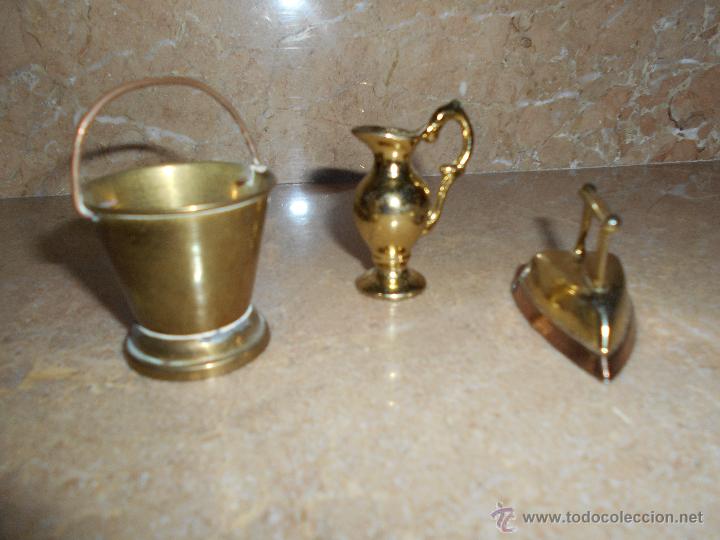 pequeños objetos de metal para casa de muñecas Comprar