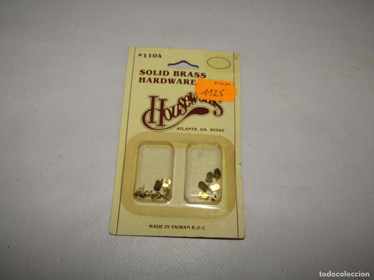 Casas de Mu&ntilde;ecas: Antiguo Bl&iacute;ster con 12 Ruedas de Lat&oacute;n para Muebles en Miniatura de CASITAS DE MU&Ntilde;ECAS