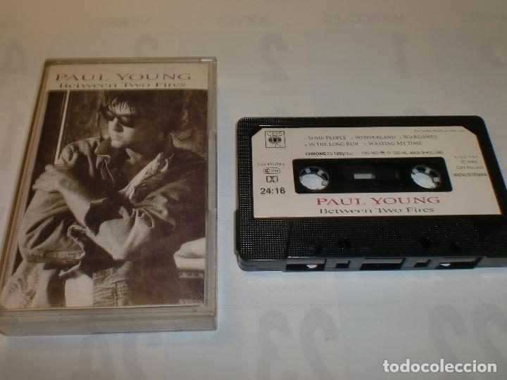 Casetes antiguos: PAUL YOUNG BETWEN TWO FIRE - Foto 1