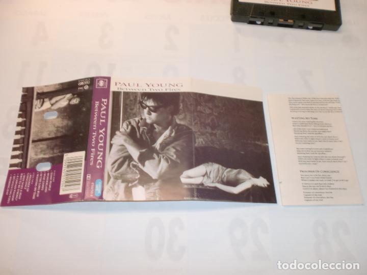 Casetes antiguos: PAUL YOUNG BETWEN TWO FIRE - Foto 2
