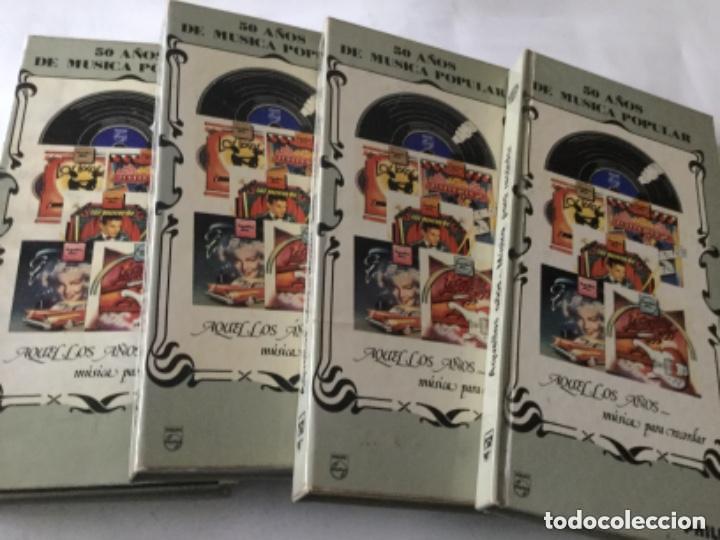 Casetes antiguos: 50 a&ntilde;os de m&uacute;sica popular- 3 estuches con 3 casetes c/u. y un libro