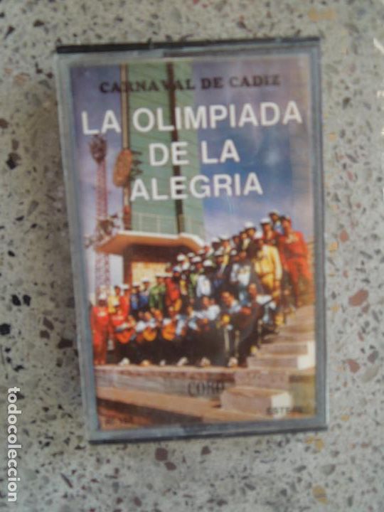 Casetes antiguos: LA OLIMPIADA DE LA ALEGRIA - CARNAVAL DE CADIZ - CORO - CASETE