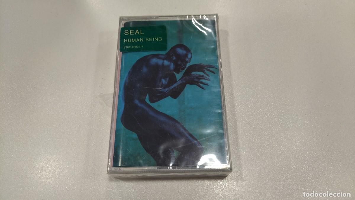 Cassetes antigas: 0526-CASSETTE-SEAL HUMAN BEING- PRECINTADO