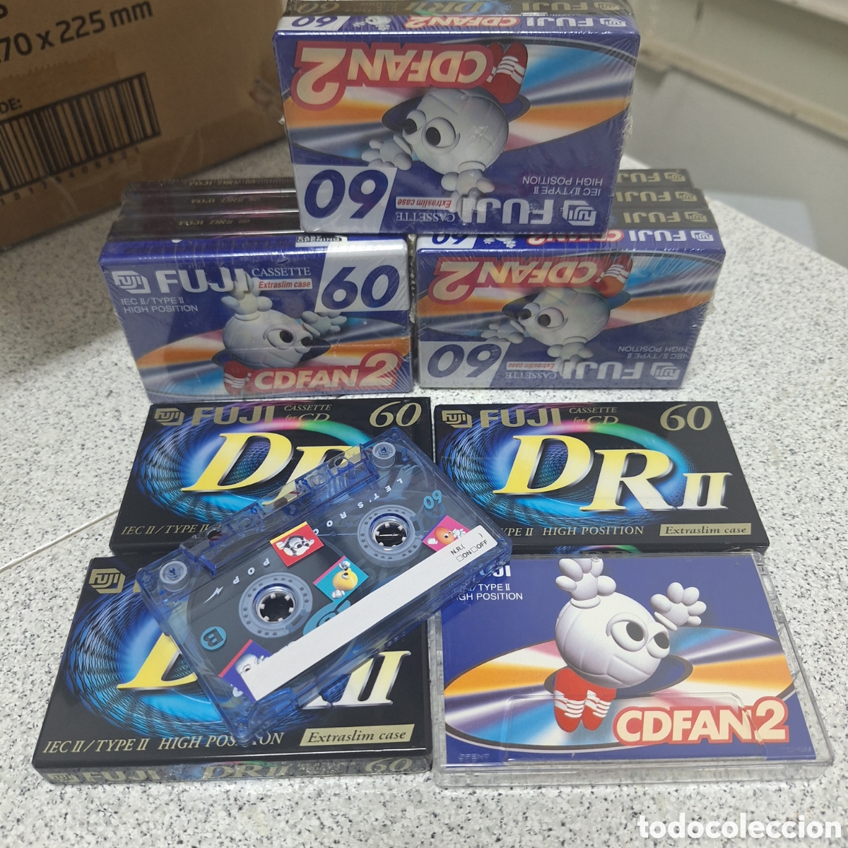 Casetes antiguos: Cassette virgen,de la marca Fuji,lote de 100 piezas blister cerrados con 4 cassette.