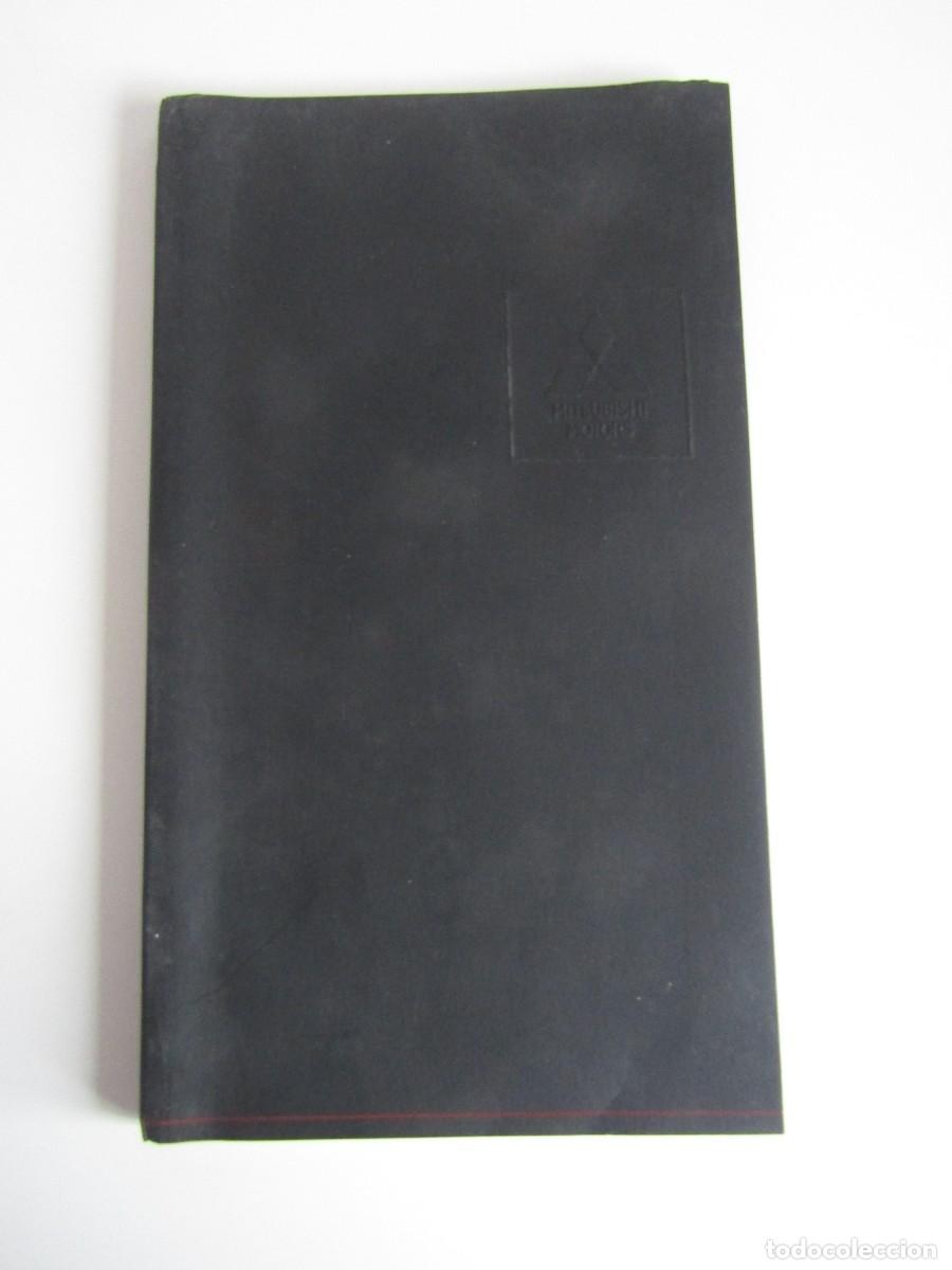 Coches y Motocicletas: DOSSIER DE PRENSA - PRESS KIT DVD MITSUBISHI SALON INTERNACIONAL AUTOMOVIL PARIS 2004