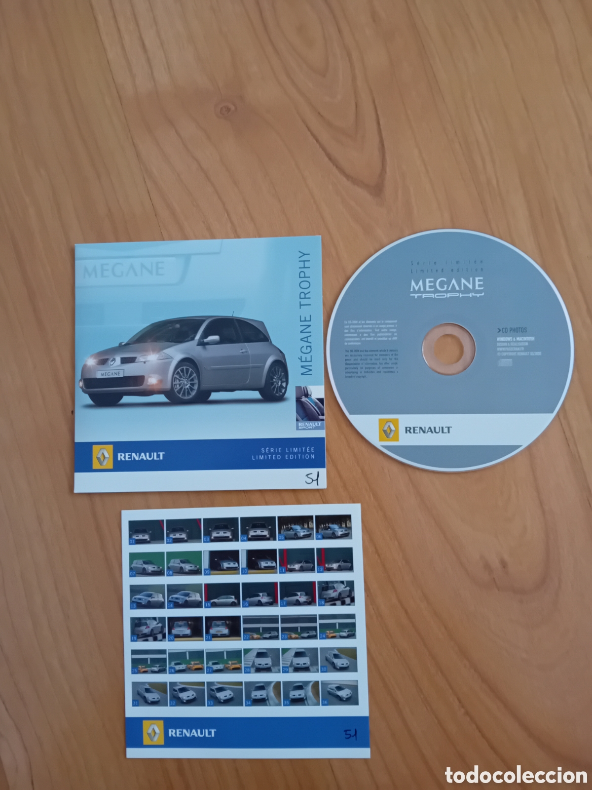 Coches y motocicletas: CD RENAULT SPORT MEGANE TROPHY CON BANCO DE FOTOS DE USO INTERNO DE RENAULT. 2005