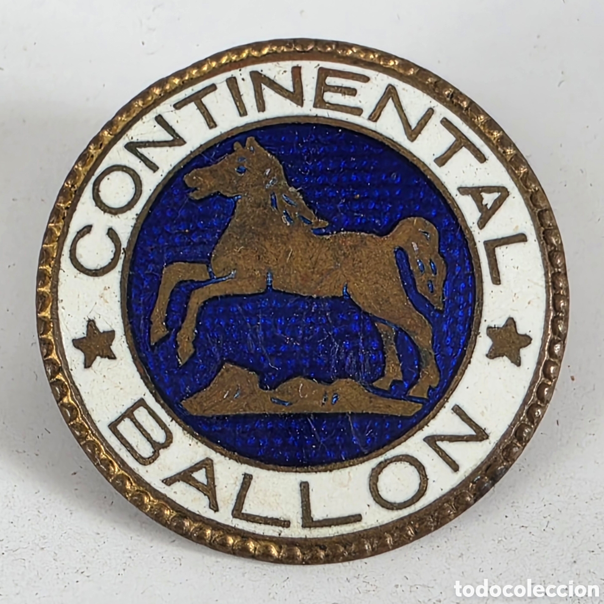 Coches y motocicletas: Antigua Insignia aguja Continental Ballon - Publicidad Neum&aacute;ticos