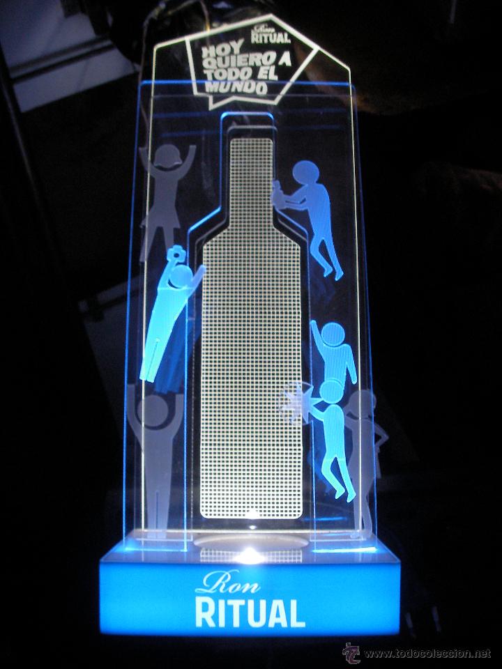 Cat&aacute;logos publicit&aacute;rios: SOPORTE ELECTRICO ILUMINADO PARA COLOCAR BOTELLA RON RITUAL CON CAMBIOS DE TONALIDAD