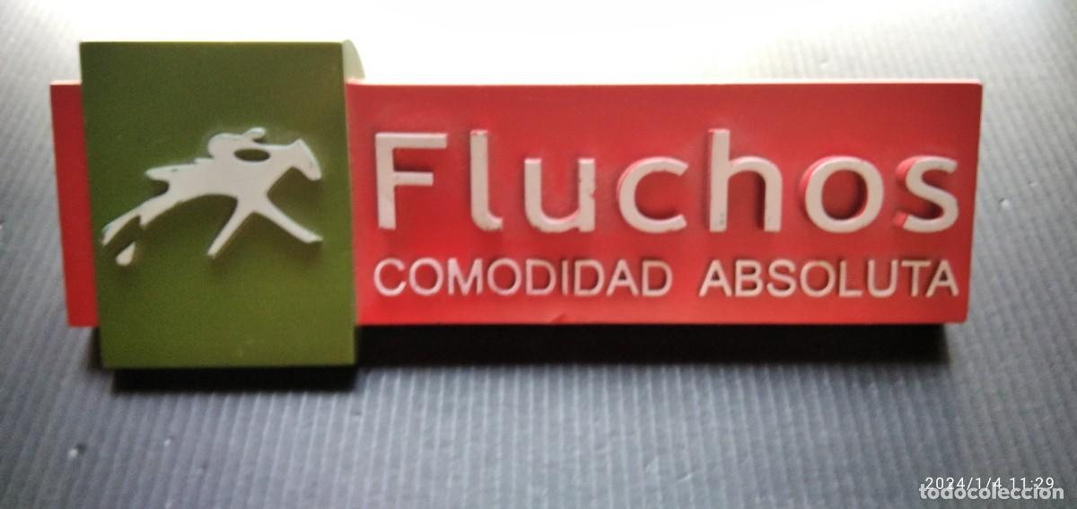 Cat&aacute;logos publicitarios: EXPOSITOR PUBLICITARIO DE CALZADOS FLUCHOS,COMONIDAD ABSOLUTA,EN RELIEVE (DESCRIPCI&Oacute;N)