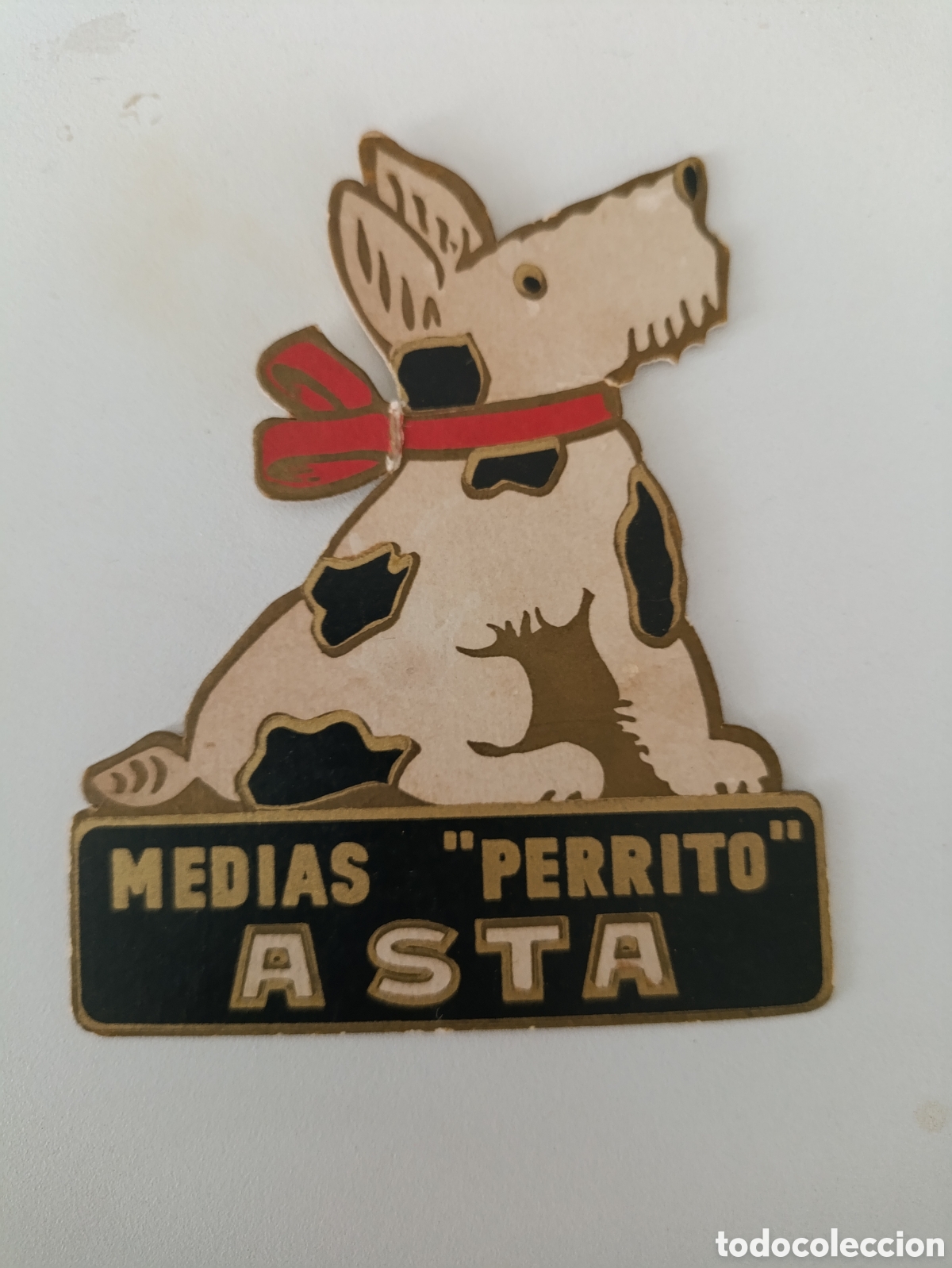 Catalogues publicitaires: Peque&ntilde;a publicidad en cart&oacute;n Medias Perrito Asta