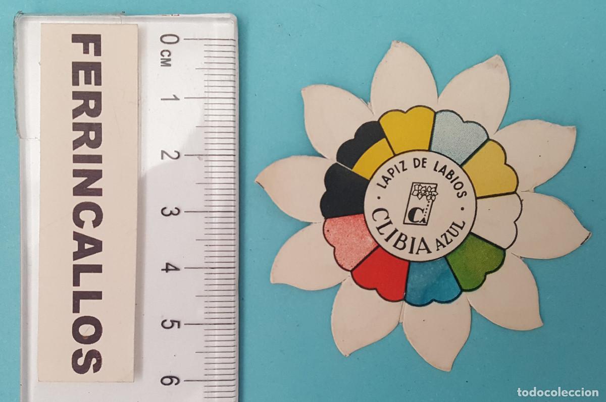 Werbekataloge: PUBLICIDAD LAPIZ DE LABIOS CLIBIA AZUL, EL LAPIZ DE LABIOPS QUE EMBELLECE Y PROTEGE, 6 CM DIAMETRO