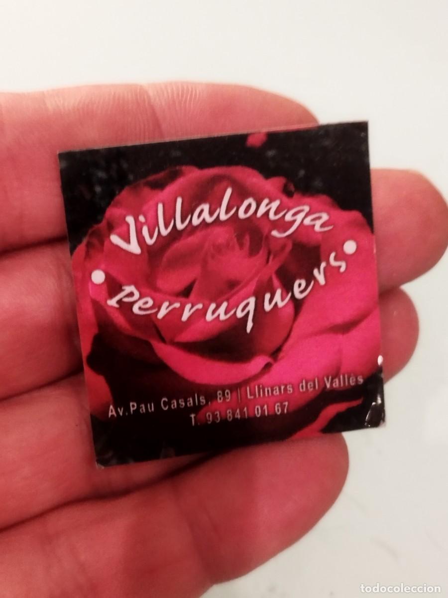 Cat&aacute;logos publicitarios: Im&aacute;n de nevera de publicidad Villalonga Perruquers, llinars del valles.