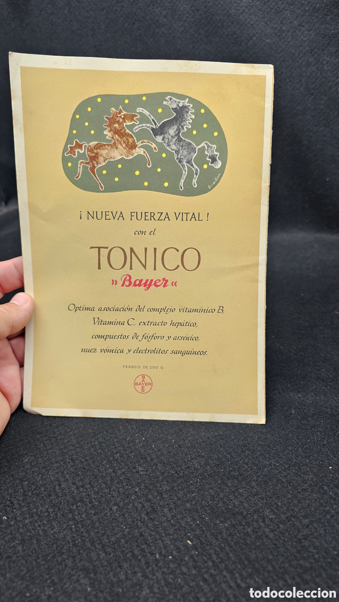 Cat&aacute;logos publicitarios: Anuncio publicitario antiguo de papel para el T&oacute;nico Bayer