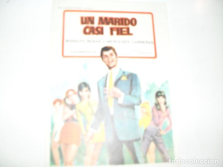Cine: programa de mano sencillo,sin texto publicitario.titulo: UN MARIDO CASI FIEL.