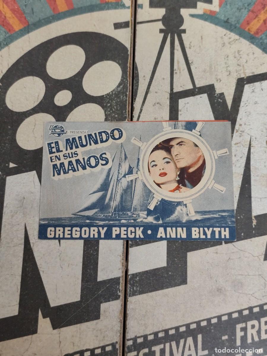 Cine: El mundo en sus manos doble troquelado con publicidad Cine San Sebasti&aacute;n Sevilla