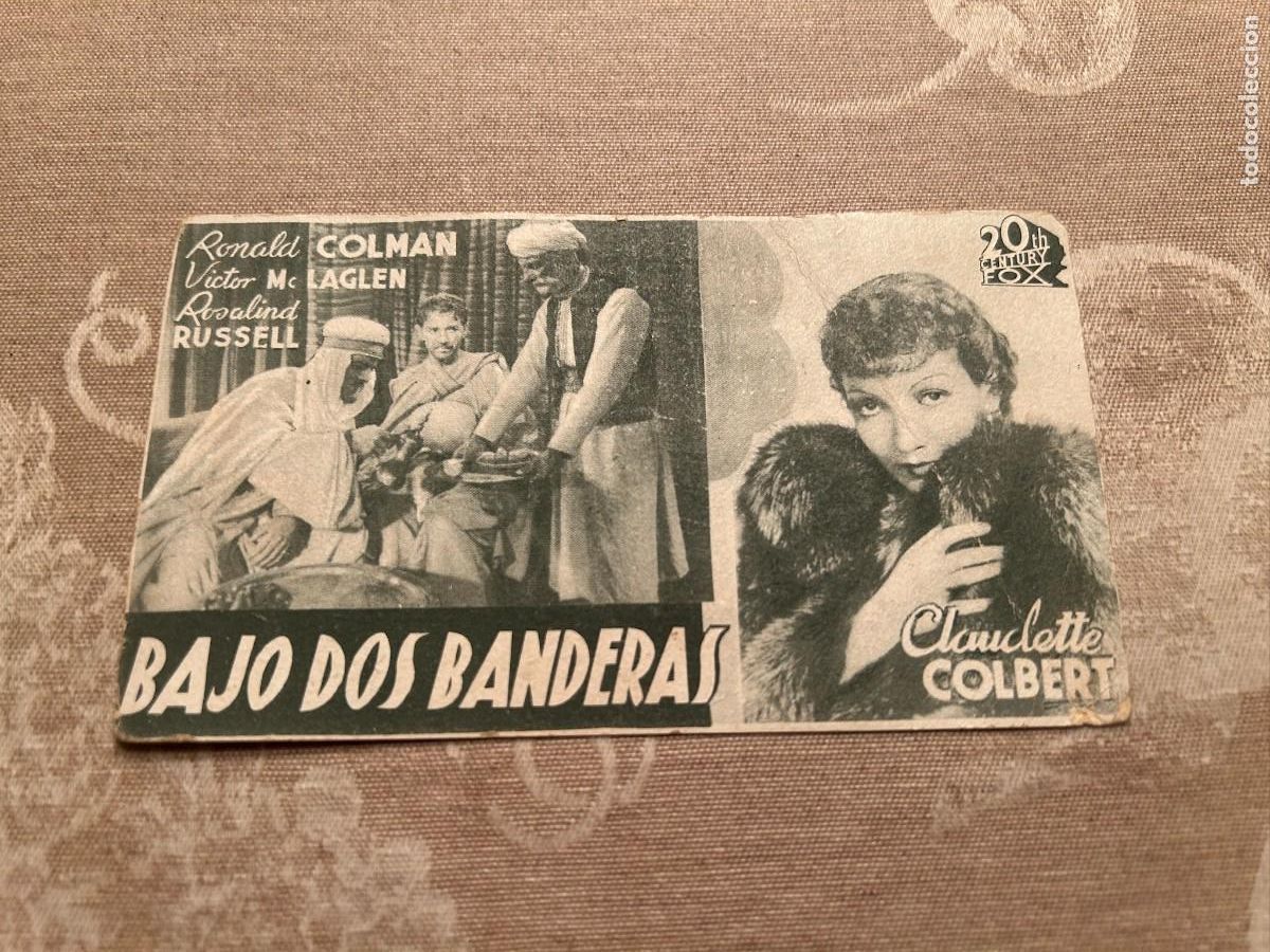 Cine: 989 BAJO DOS BANDERAS COLISEO OLYMPIA MALAGA BUEN ESTADO CON PUBLICIDAD