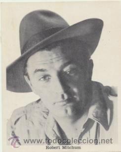 Cine: Cromo (11X8,5)  Robert Mitchum en La Hechicera Blanca.