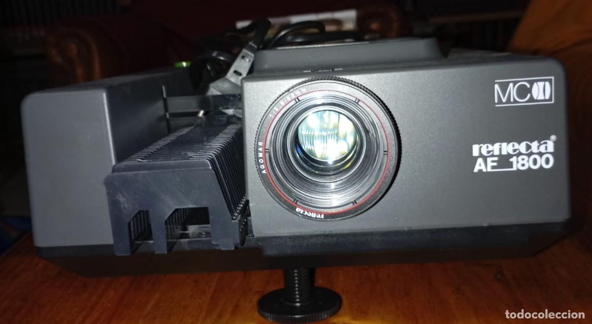 Cine: Lote con aprox. 800 Diapositivas Slides promocional pel&iacute;culas + Proyector Reflecta AF1800