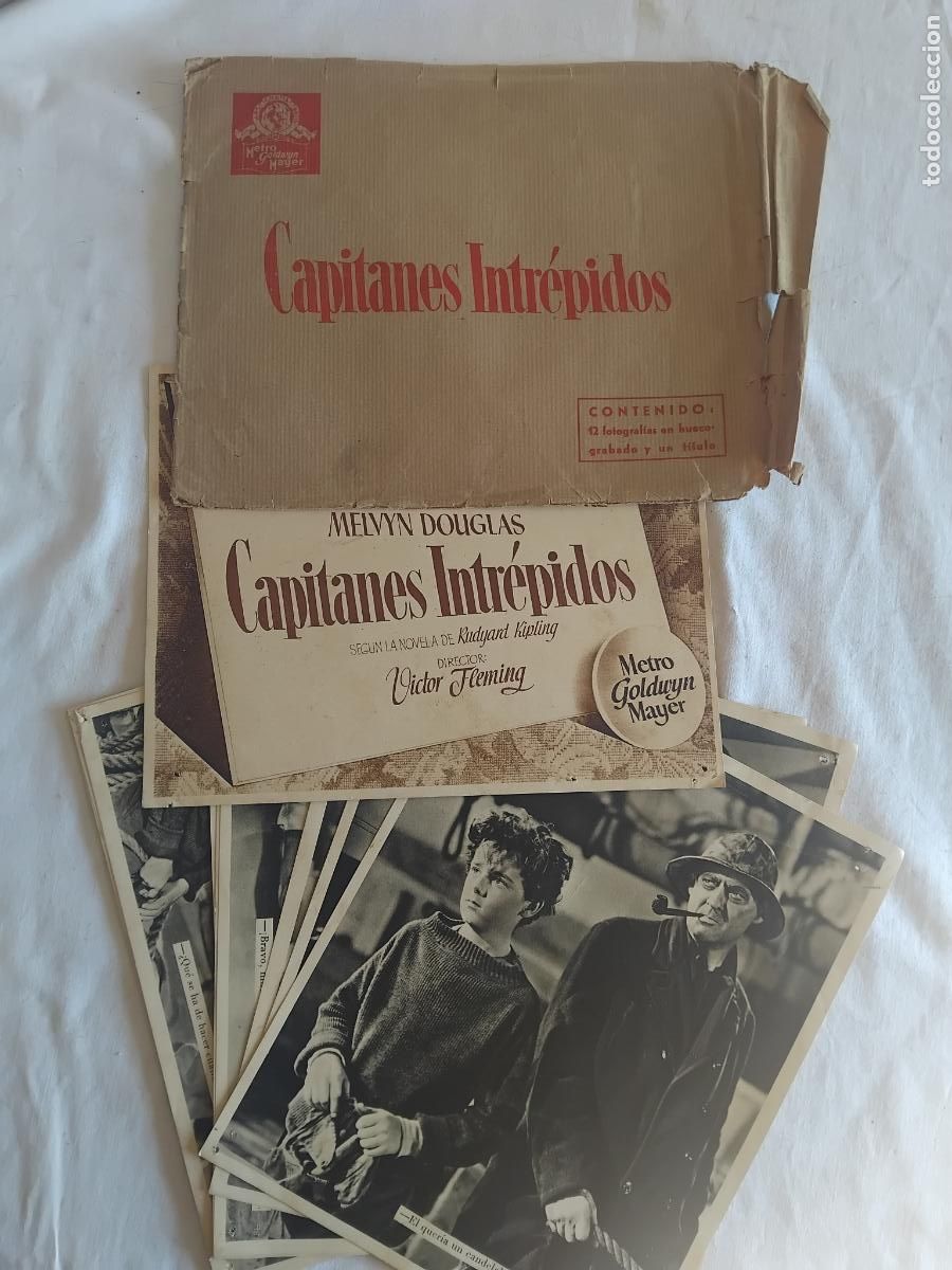 Cine: CAPITANES INTREPIDOS. METRO GOLDWYN MAYER. 12 FOTOGRAFIAS EN HUECOGRABADO Y UN TITULO.